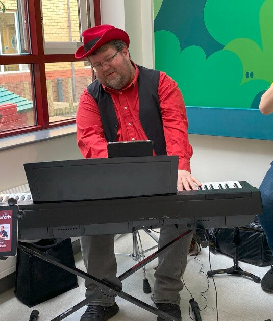 Christopher Lydon performing at Royal Derby Hospital Children's ward